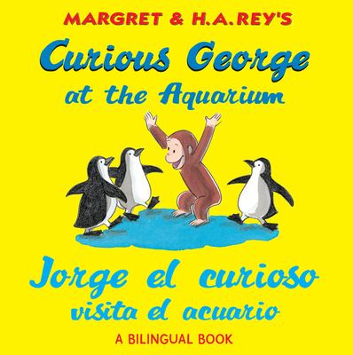 Curious George at the aquarium = Jorge el curioso visita el acuario