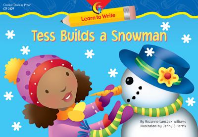 Tess builds a snowman